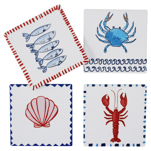 Set of four coasters with Mediterranean-themed designs on a white background