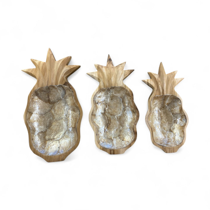 Handcrafted teak wood serving bowls in the shape of a pineapple inlayed with shell