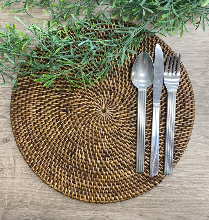 round rattan placemat with darker antique stain finish