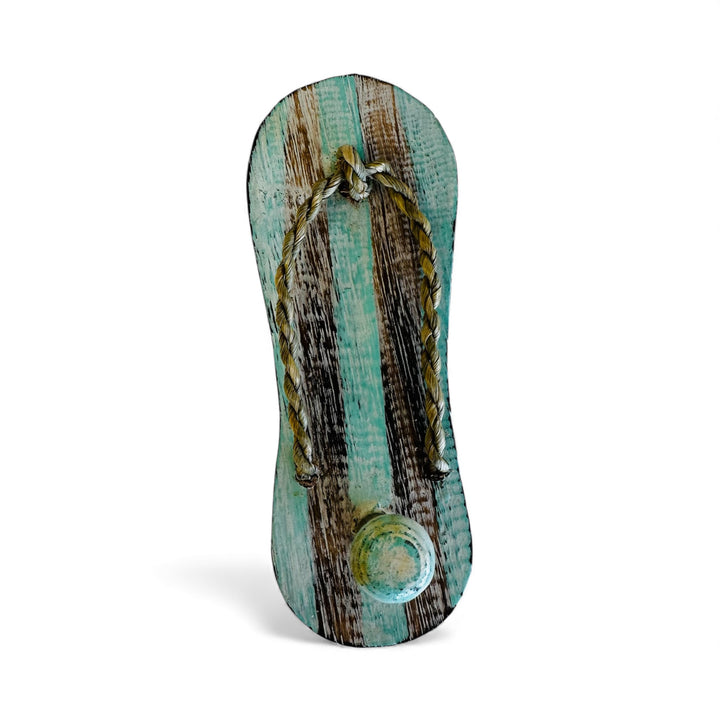 Handcrafted timber flip-flop wall hook in aqua and white, beach-inspired coastal décor perfect for hanging towels, keys, or accessories in a seaside home.