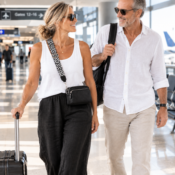 Black Kyla crossbody bag worn with black linen pants and a white singlet