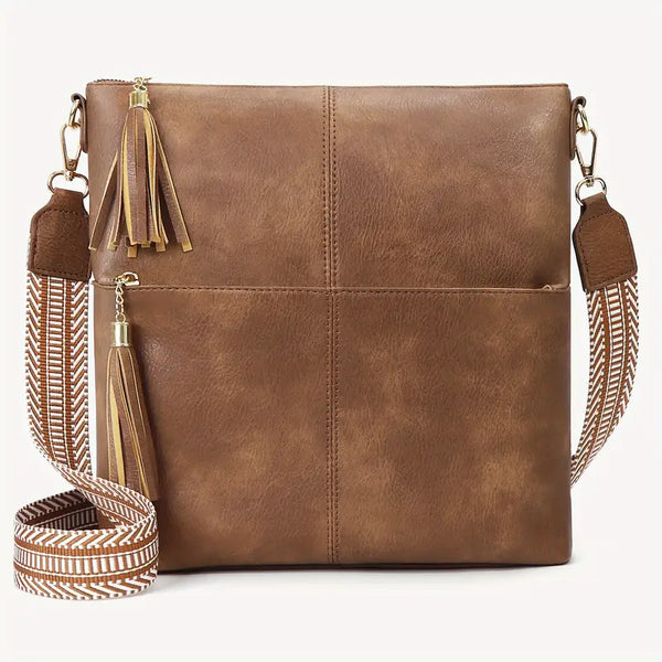 Brown crossbody bag with adjustable strap and gold hardware