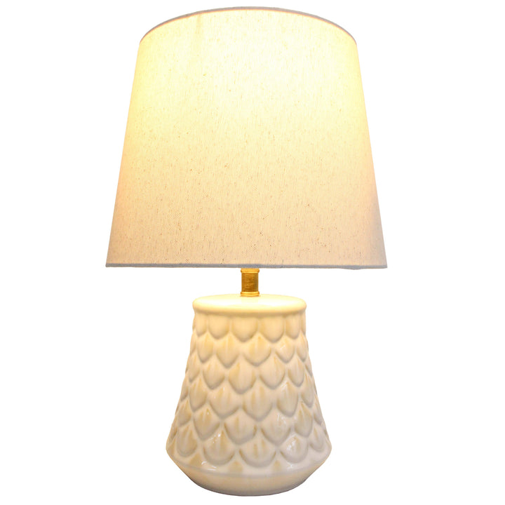 Handcrafted white shell ceramic table lamp with textured finish, elegant coastal style home décor lighting.