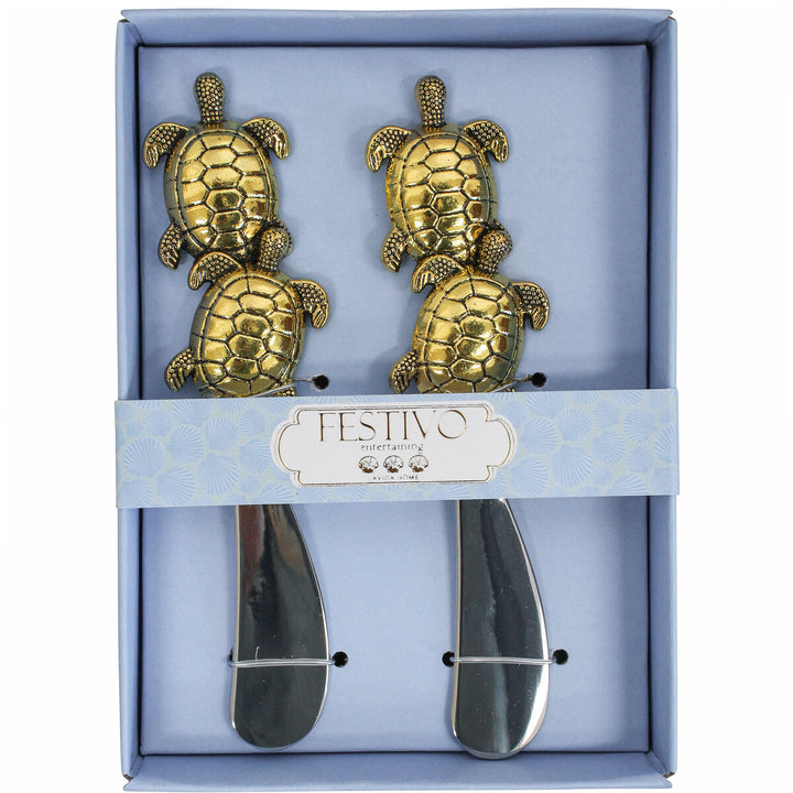 Two turtle-themed cheesknife sets in a box