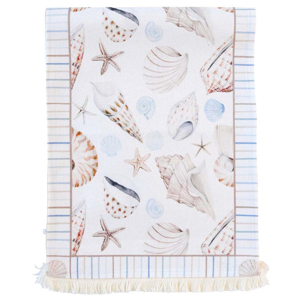 Coastal table runner with shell and starfish print in soft seaside colours,  with fringe ends
