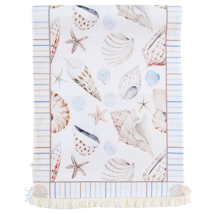 Coastal table runner with shell and starfish print in soft seaside colours,  with fringe ends
