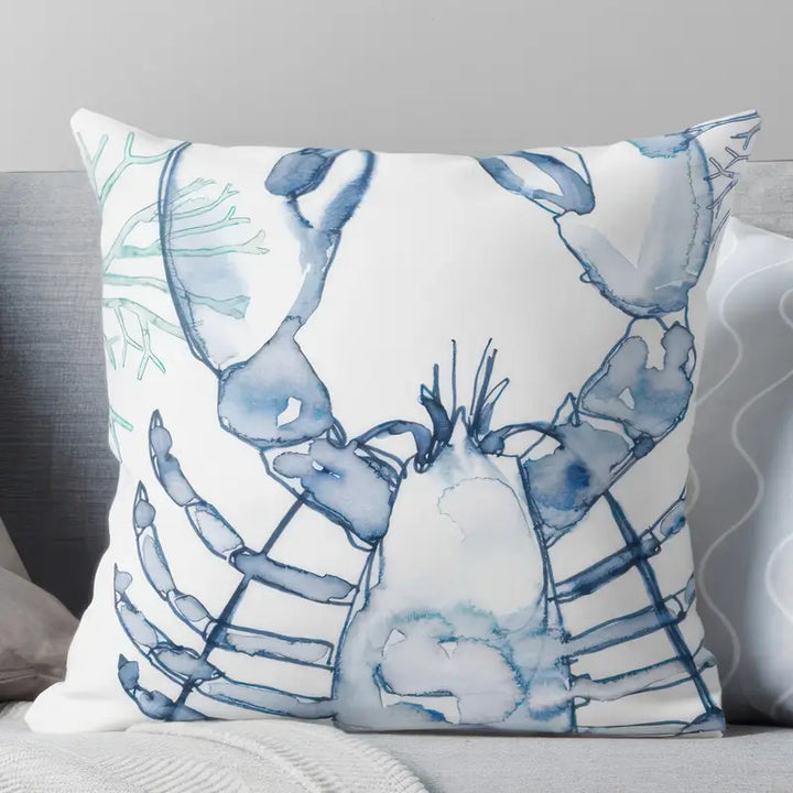 Coastal Catch cushion with coral and lobster print in aqua blue