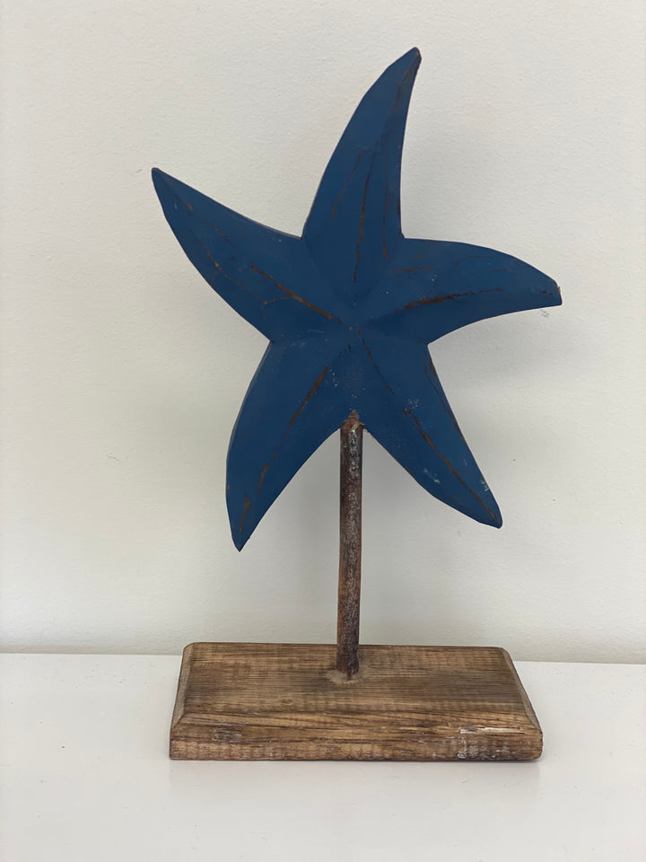 Navy wooden starfish on stand