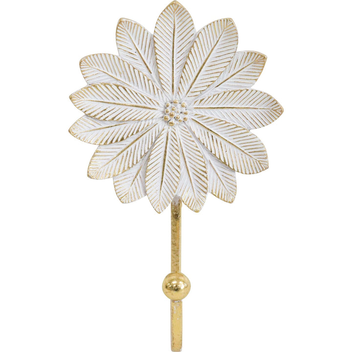 A decorative wall hook with an intricate palm leaf design in white and gold colors, made from resin.
