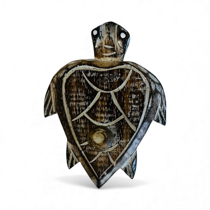 Small wooden turtle wall hook, handcrafted coastal décor piece perfect for hanging keys, towels, or accessories in a beach-style home