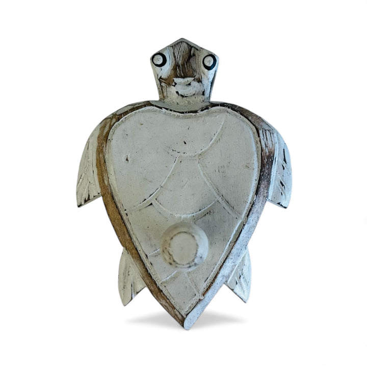 Handcrafted small wooden turtle wall hook with white back, coastal beach house décor ideal for hanging towels, keys, or accessories.