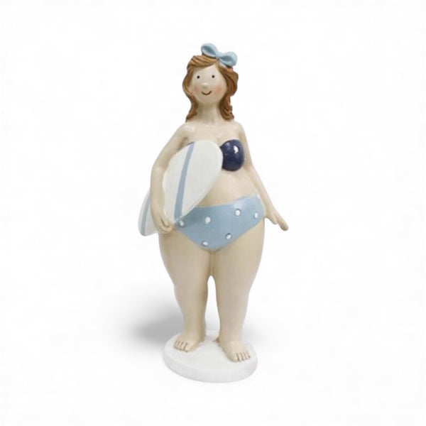 Bring sunshine and fun to any space with the surfing lady figurine. Vintage inspired, hand painted resin figures add whimsical, beachy charm to your home or gift collection.