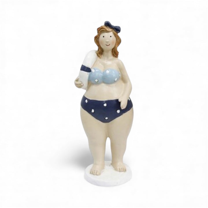 Bring sunshine and fun to any space with the swimming lady figurine. Vintage inspired, hand painted resin figures add whimsical, beachy charm to your home or gift collection.