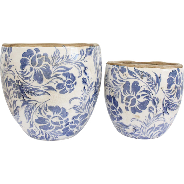 Vintage blue and white ceramic planter with crackle glaze and ornate print, perfect for displaying indoor plants or flowers
