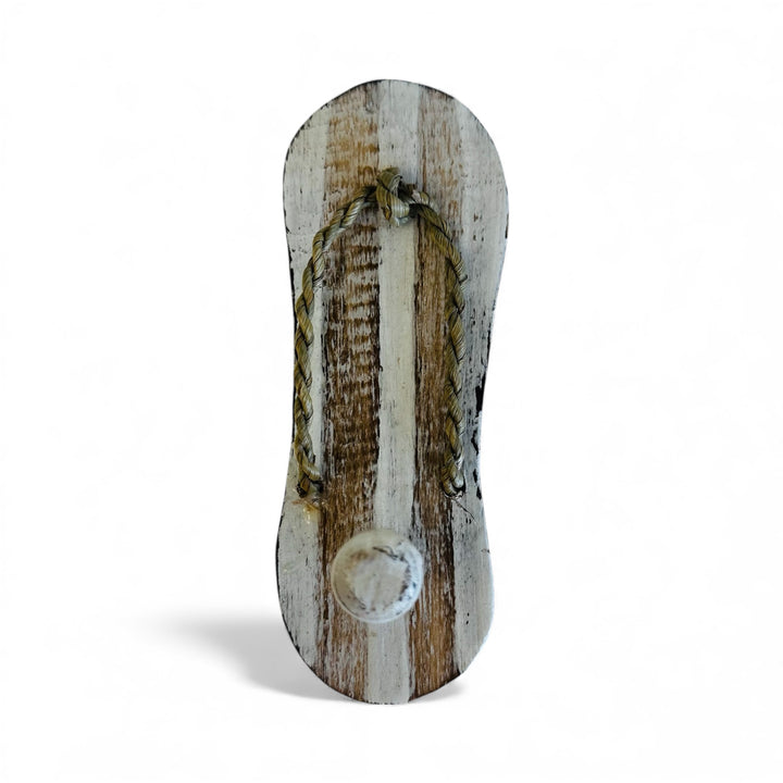 Handcrafted timber flip-flop wall hook in white and natural stripes, small coastal home décor accessory ideal for beach houses, bathrooms, or entryways.