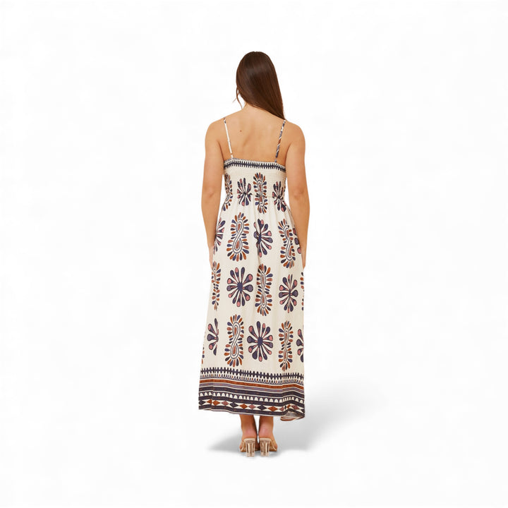 woman wearing boho print dress, back view