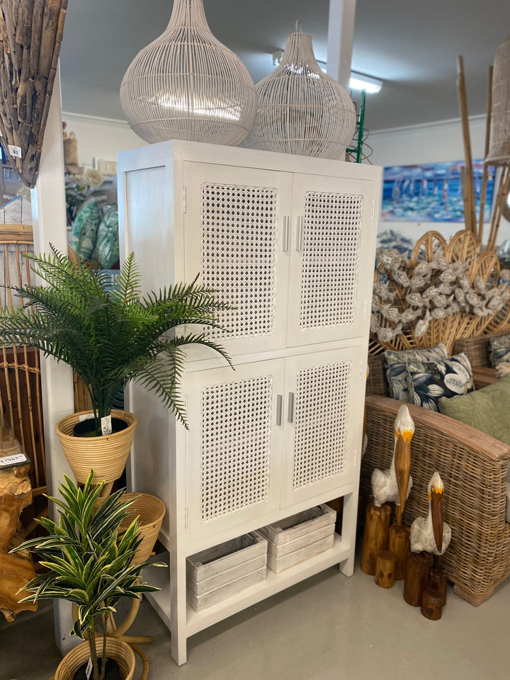 Handcrafted all white timber and rattan cabinet with four mesh doors, sustainable coastal furniture by Coastal Drift Home, Sunshine Coast Australia