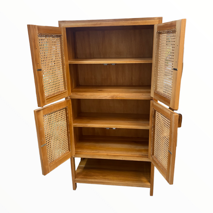 Inside of our natural timber cabinet with mesh rattan inlays in the doors