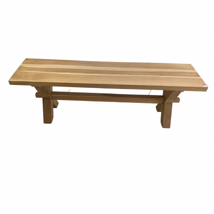 A rectangular teak wood bench with XX legs.