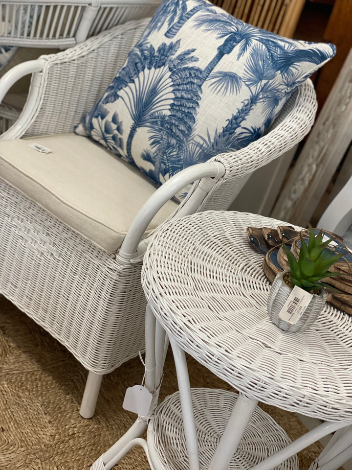 White chair and side table made of cane