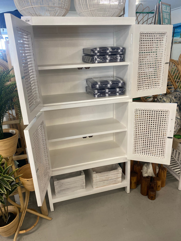 Inside view of our handcrafted timber cabinet with mesh rattan inlays in the doors
